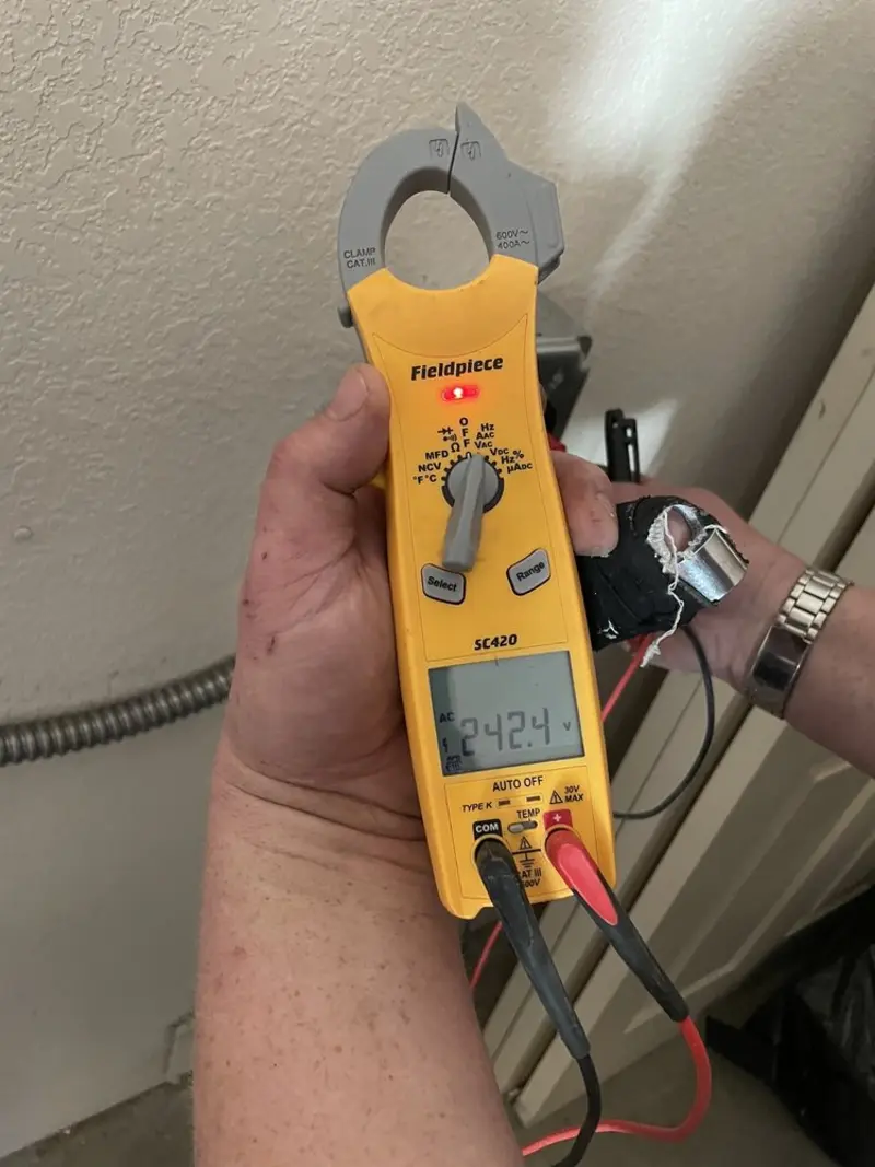 Voltage testing with clamp meter during Generator Installation in Coeur d'Alene